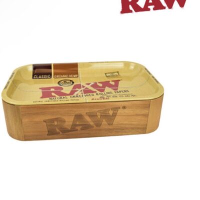 RAW CACHE BOX (“Do you get yelled at for leaving all of your rolling supplies around the house? We made the new RAW Cache Box for this exact problem! Inside there is room to keep all of your rolling accessories- so that way you just take out what you need to use- put them back in when youre done- throw the top back on and thats it! The top is magnetically held- comes with a RAW tray- and keeps everything neat & tidy. You are welcome! 11 x 7 x 3.5 Each RAW Cache Box comes with a Small RAW Classic Rolling Tray and is compatible with any Small RAW Rolling Tray (11 x 7) SOLD INDIVIDUALLY” )